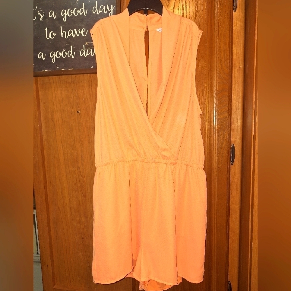 Elegant Coral Naked Zebra Sleeveless Romper In A Size Medium. EUC